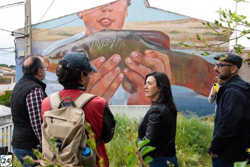 Nuevos murales de Muro Crítico en Piedras Albas celebran la dehesa y la pesca tradicional de tencas.